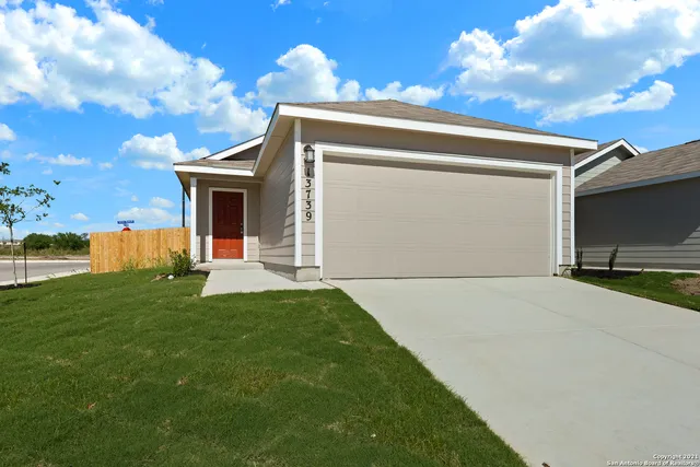 a view of backyard of house