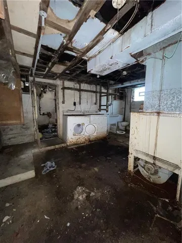 a view of folding clothes and fire pit