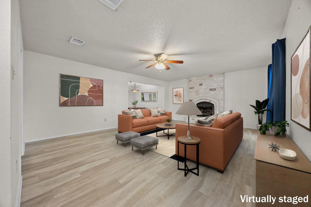 1000 West Noton Street Pflugerville, TX 78660 - Photo 6 of 35 a living room with furniture and a table