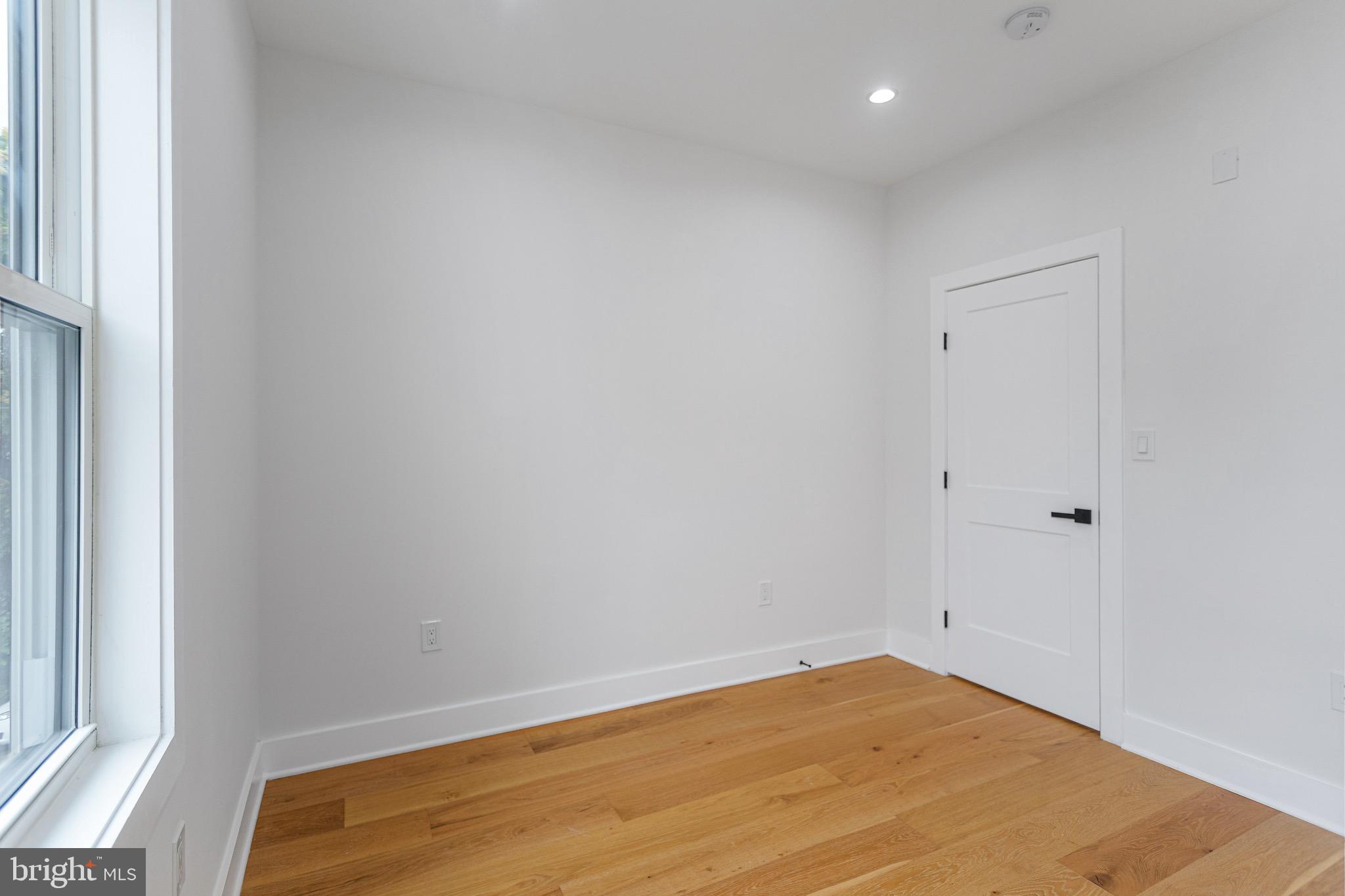 1107 Queen Street Northeast, Unit PH4 Washington, DC 20002 - Photo 19 of 28 a view of empty room