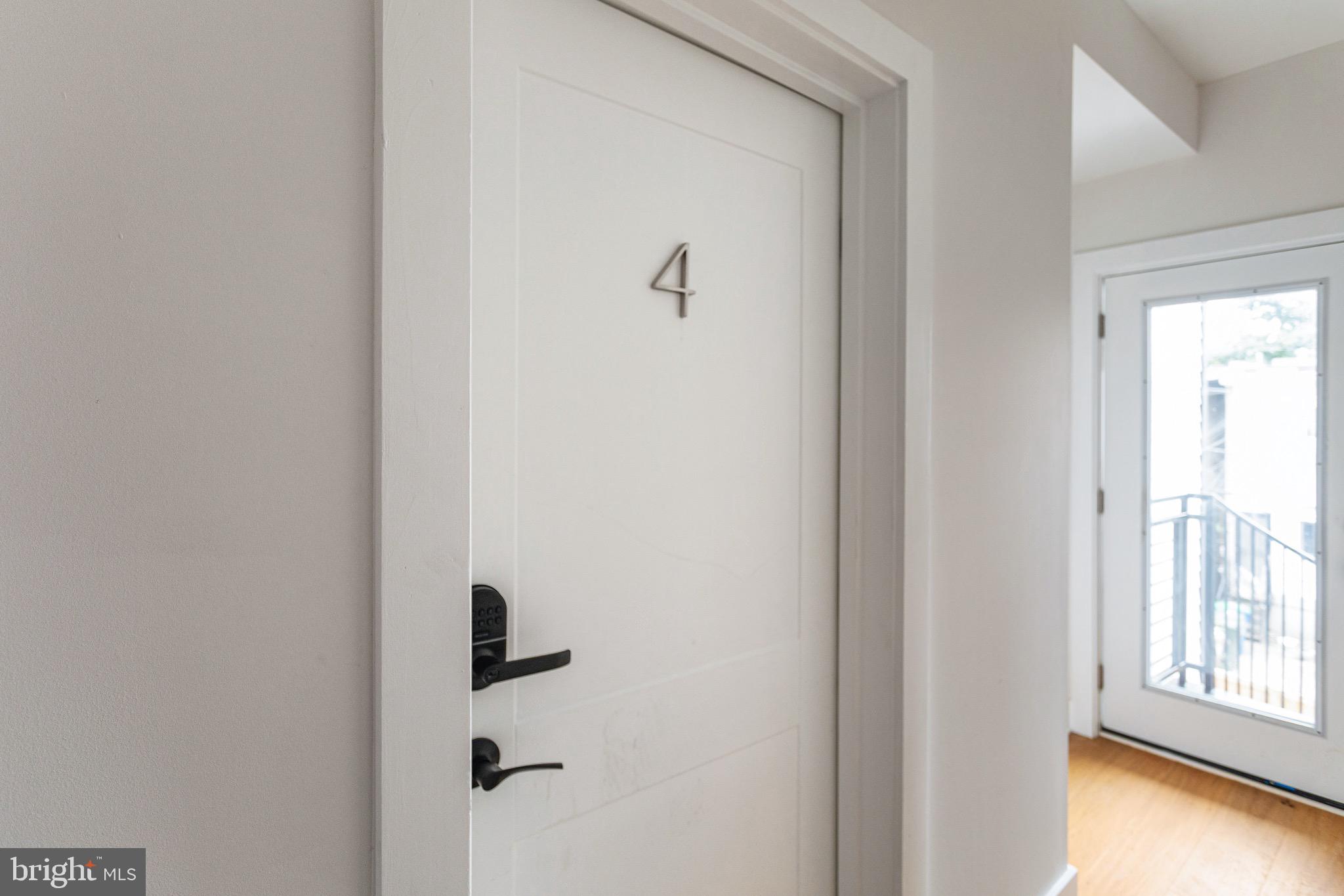 1107 Queen Street Northeast, Unit PH4 Washington, DC 20002 - Photo 23 of 28 a view of an entryway with a livingroom