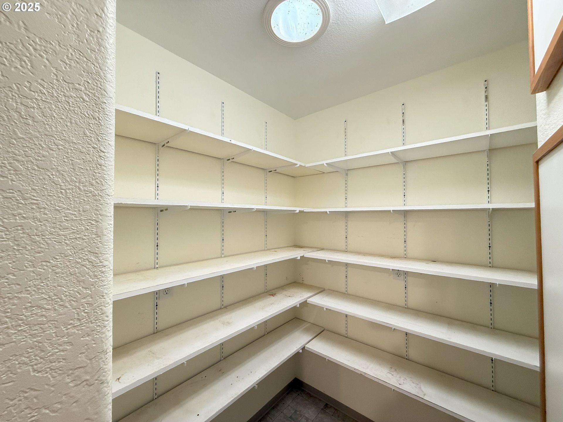 5938 View Loop Florence, OR 97439 - Photo 16 of 42 a storage room with cabinets