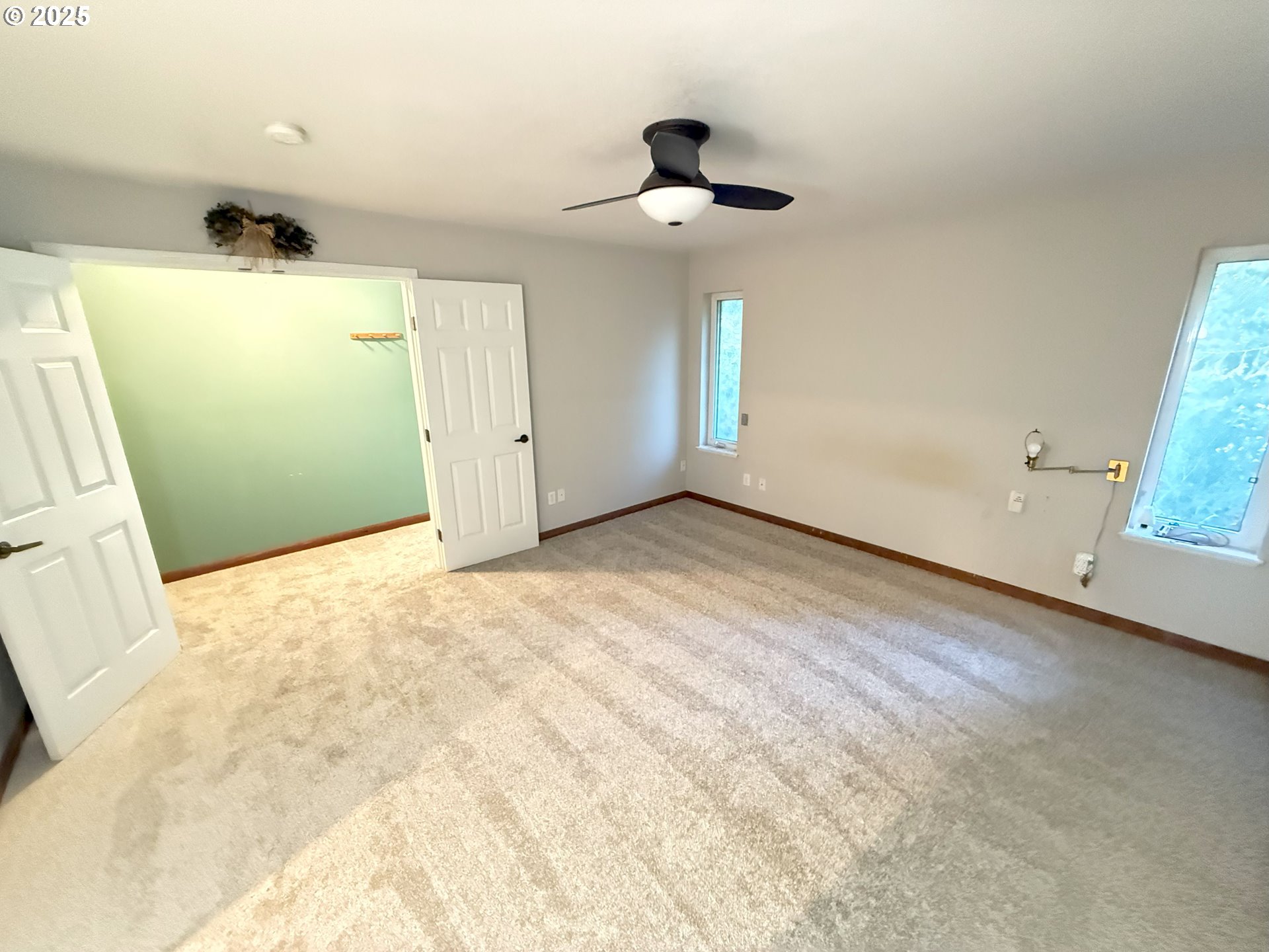5938 View Loop Florence, OR 97439 - Photo 20 of 42 a view of an empty room with a window