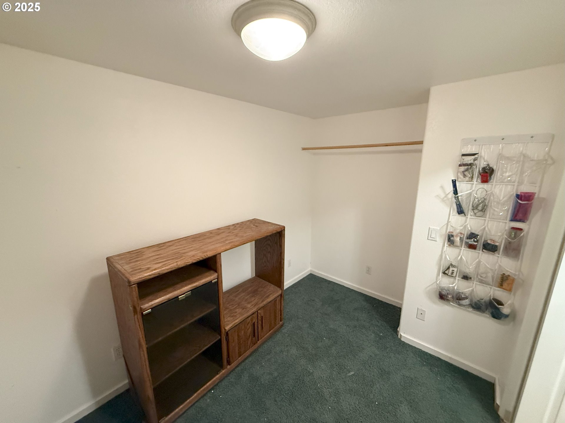 5938 View Loop Florence, OR 97439 - Photo 34 of 42 a view of room with hardwood floor