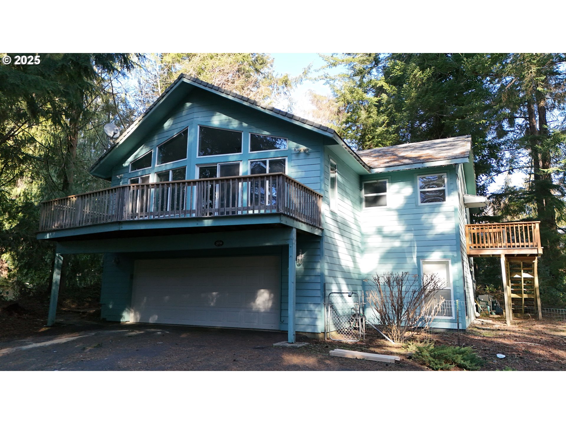 5938 View Loop Florence, OR 97439 - Photo 42 of 42 a black and white photo of a house