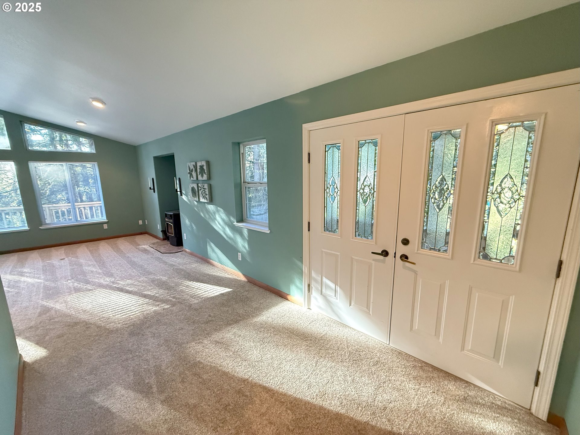 5938 View Loop Florence, OR 97439 - Photo 8 of 42 a view of an entrance with wooden floor and windows