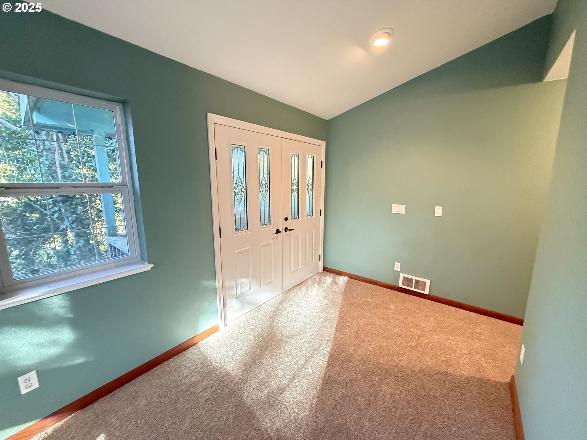 5938 View Loop Florence, OR 97439 - Photo 9 of 42 a view of a livingroom with a window