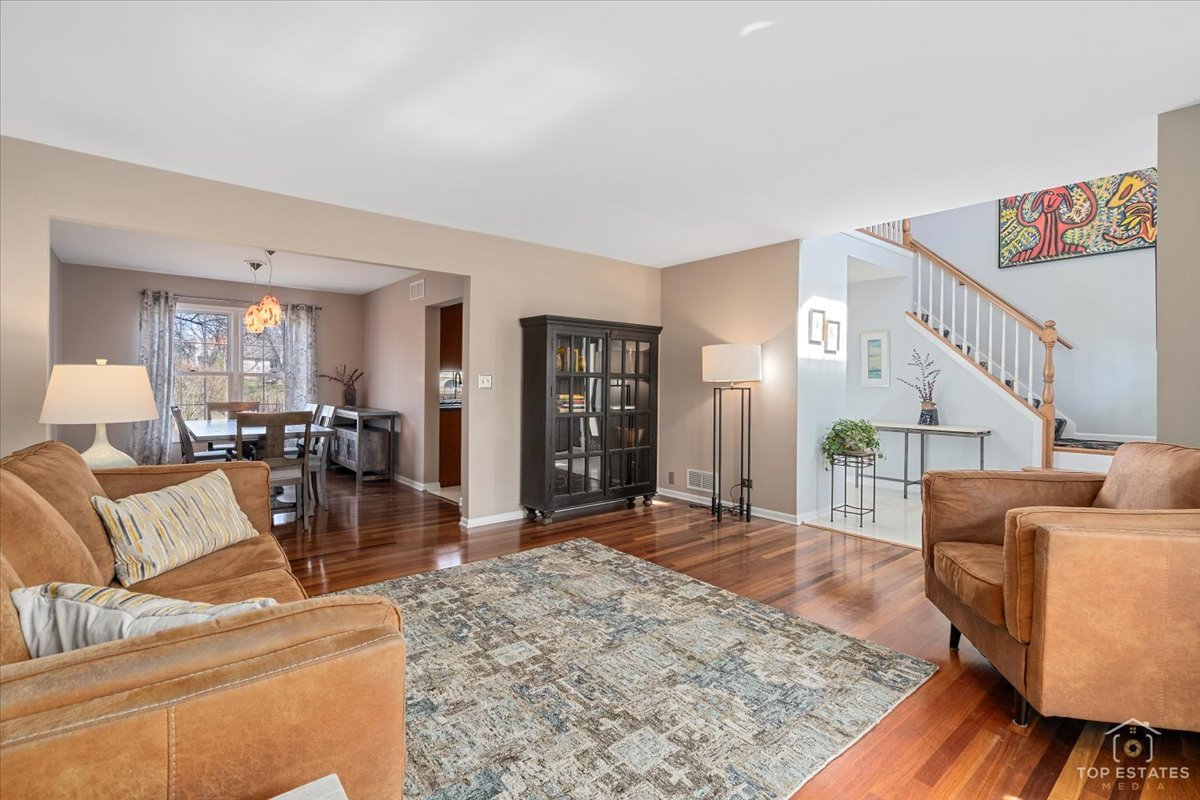 1506 Division Street St. Charles, IL 60174 - Photo 6 of 32 a living room with furniture and a wooden floor