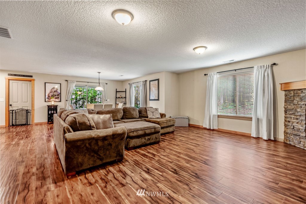 150 Cornell Road Toutle, WA 98649 - Photo 17 of 31 a living room with furniture and a wooden floor