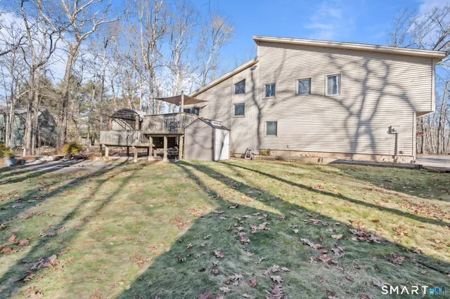 a kitchen with a sink cabinets and window