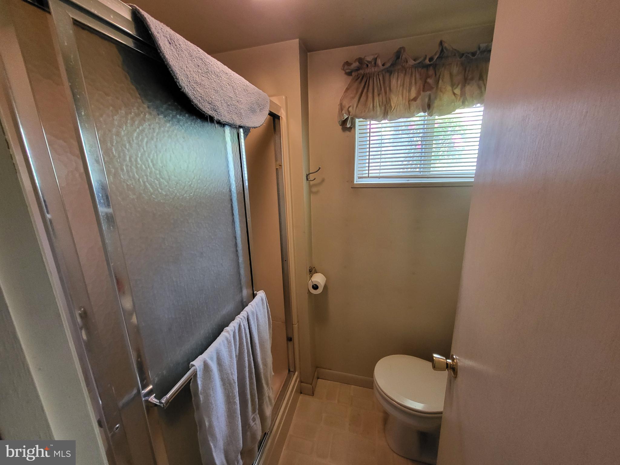 1859 Leafmore Road Chambersburg, PA 17202 - Photo 17 of 24 a bathroom with a toilet and a sink