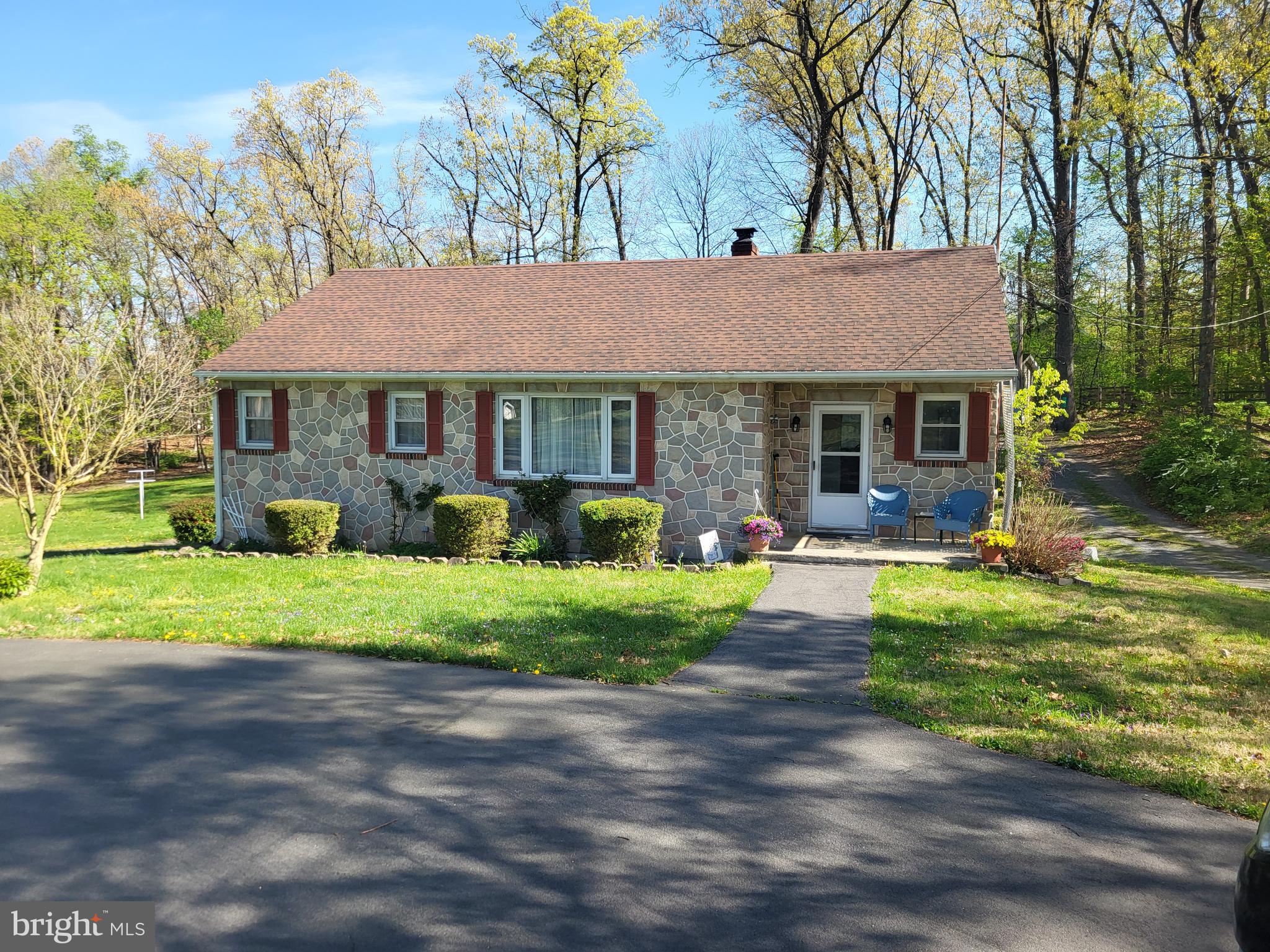 1859 Leafmore Road Chambersburg, PA 17202 - Photo 2 of 24 a front view of house with yard and green space