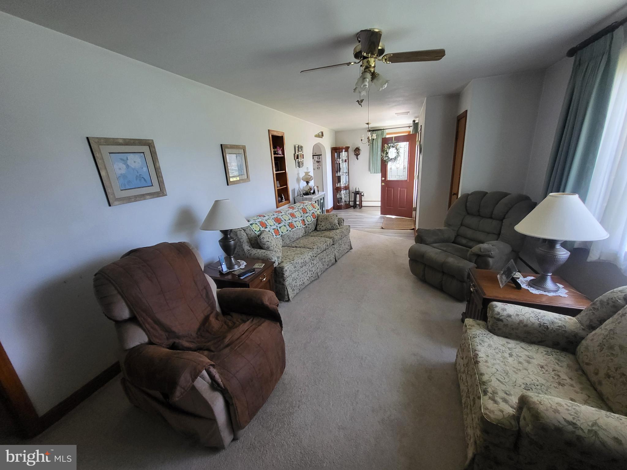 1859 Leafmore Road Chambersburg, PA 17202 - Photo 3 of 24 a living room with furniture and a chandelier