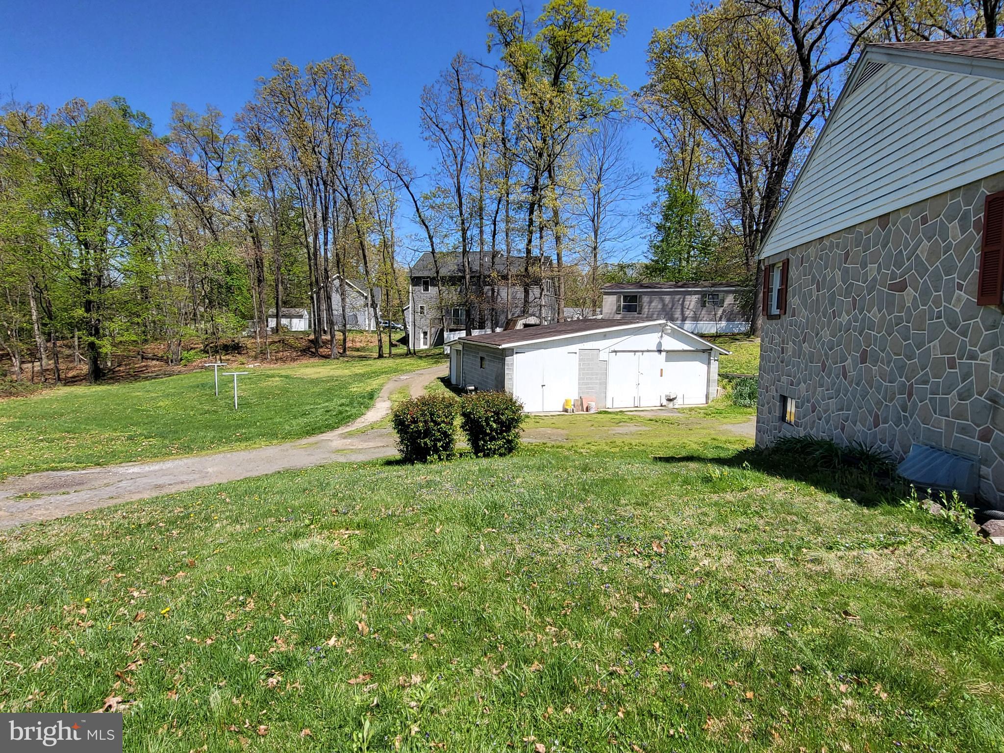 1859 Leafmore Road Chambersburg, PA 17202 - Photo 10 of 24 a house view with a garden space