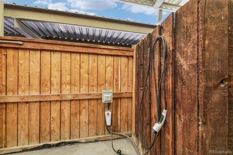 a view of a door with wooden fence