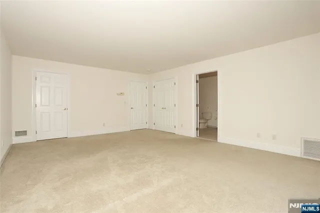 an empty room with an entryway