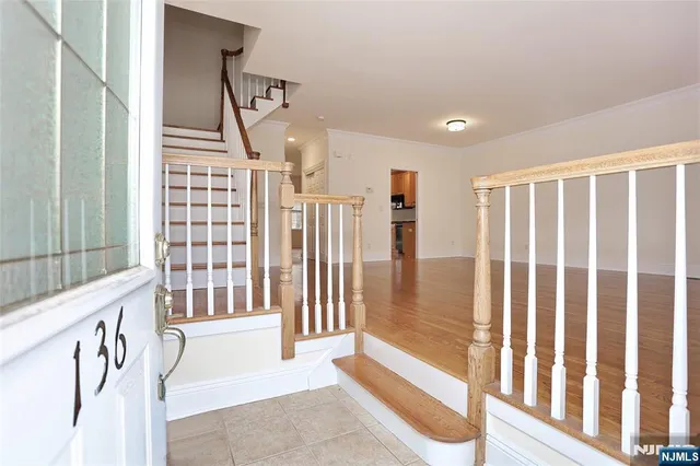 a view of front door with stairs