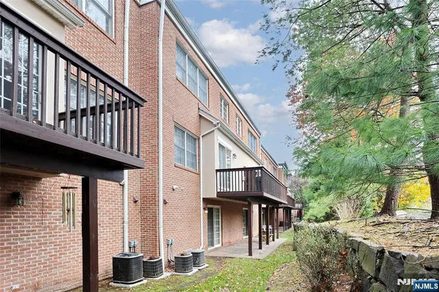 a backyard of a house with seating space