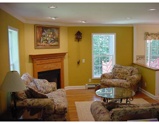 245 Benedict Road Burrillville, RI 02830 - Photo 11 of 25 a living room with furniture and a large window