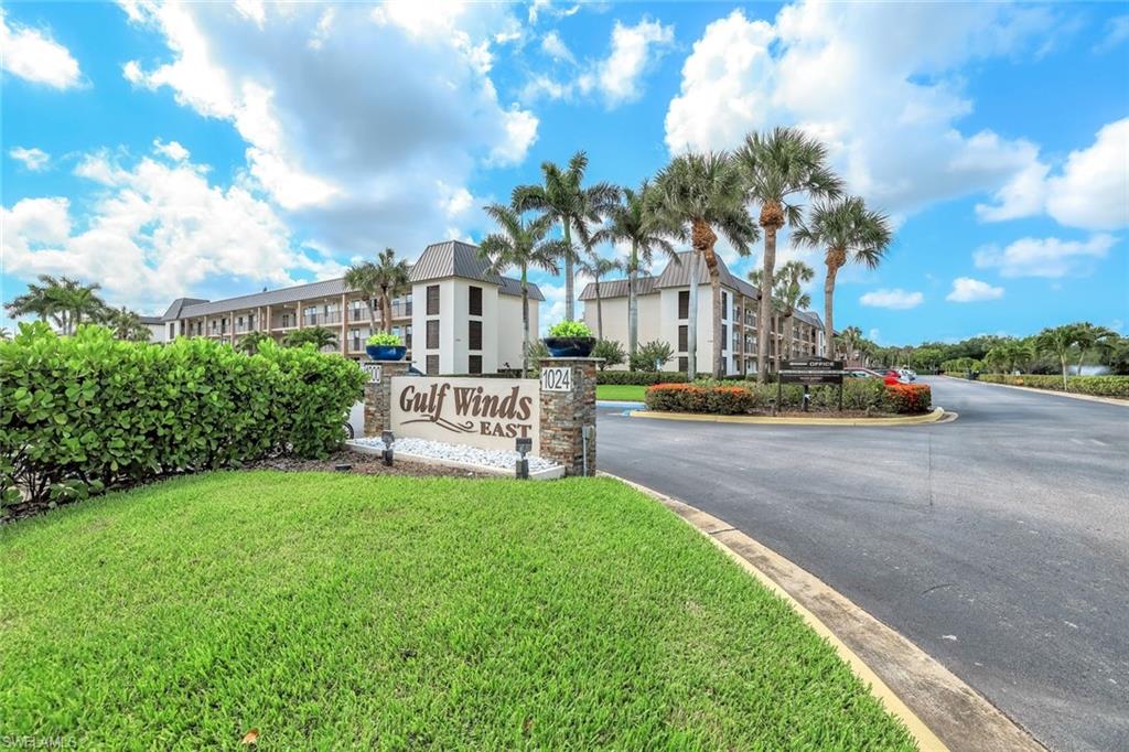1000 Manatee Road, Unit A306 Naples, FL 34114 - Photo 12 of 13 a view of a street with houses