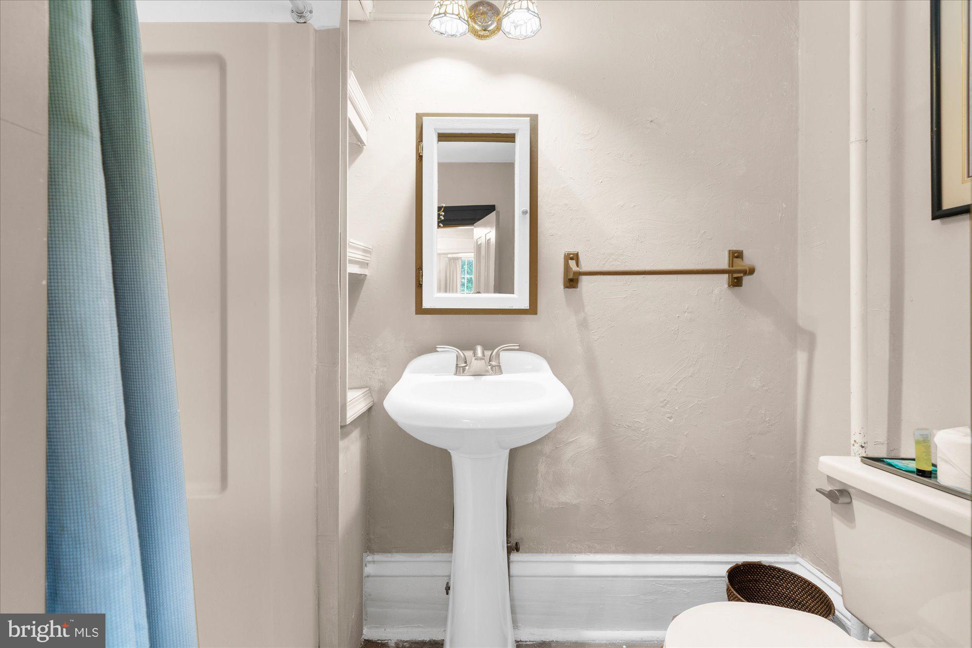 5358 York Road Doylestown, PA 18902 - Photo 13 of 61 a bathroom with a sink and a mirror