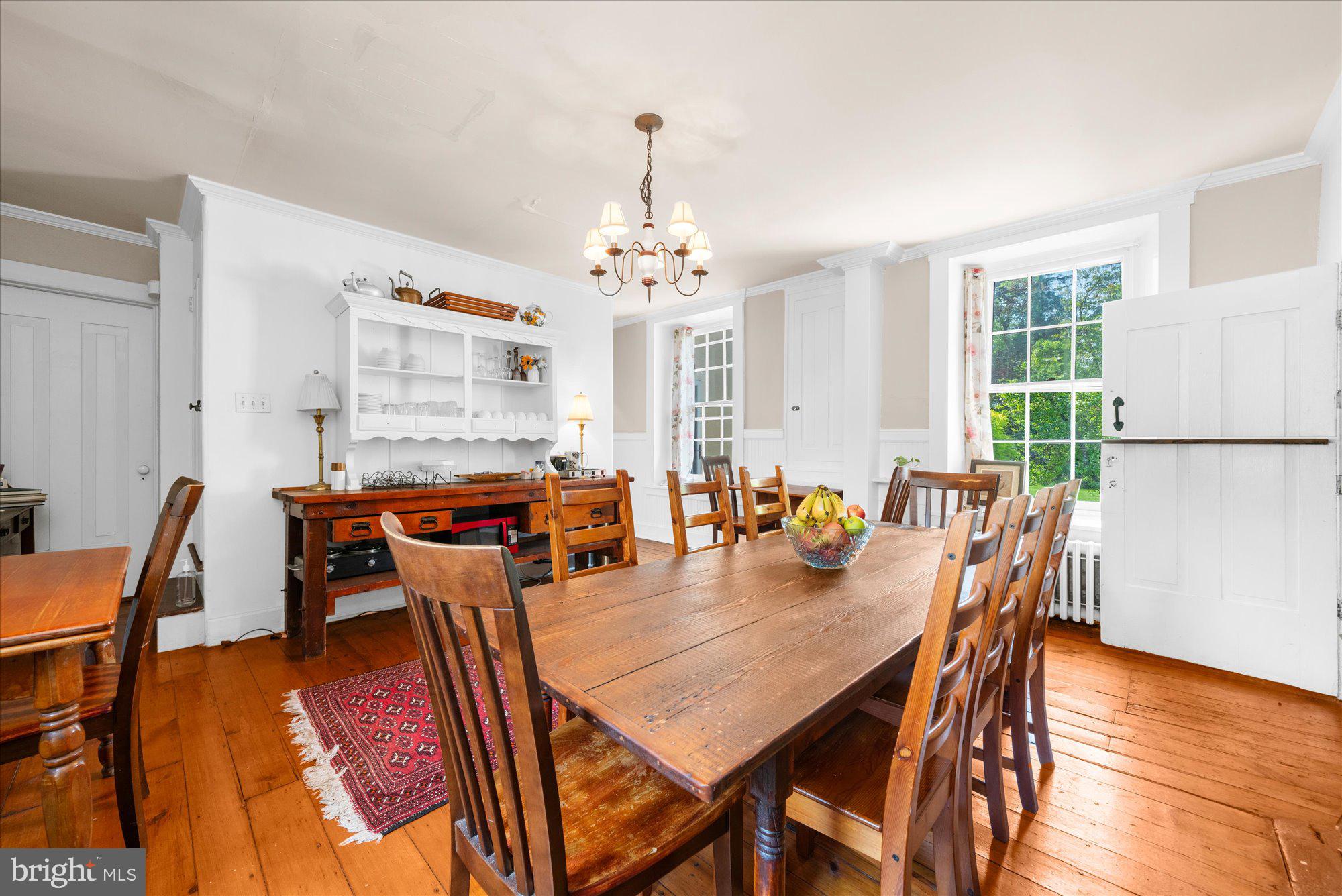 5358 York Road Doylestown, PA 18902 - Photo 17 of 61 a dining room with furniture a chandelier and wooden floor