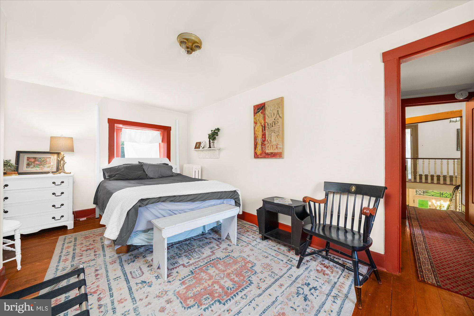 5358 York Road Doylestown, PA 18902 - Photo 20 of 61 a bedroom with a bed and wooden floor