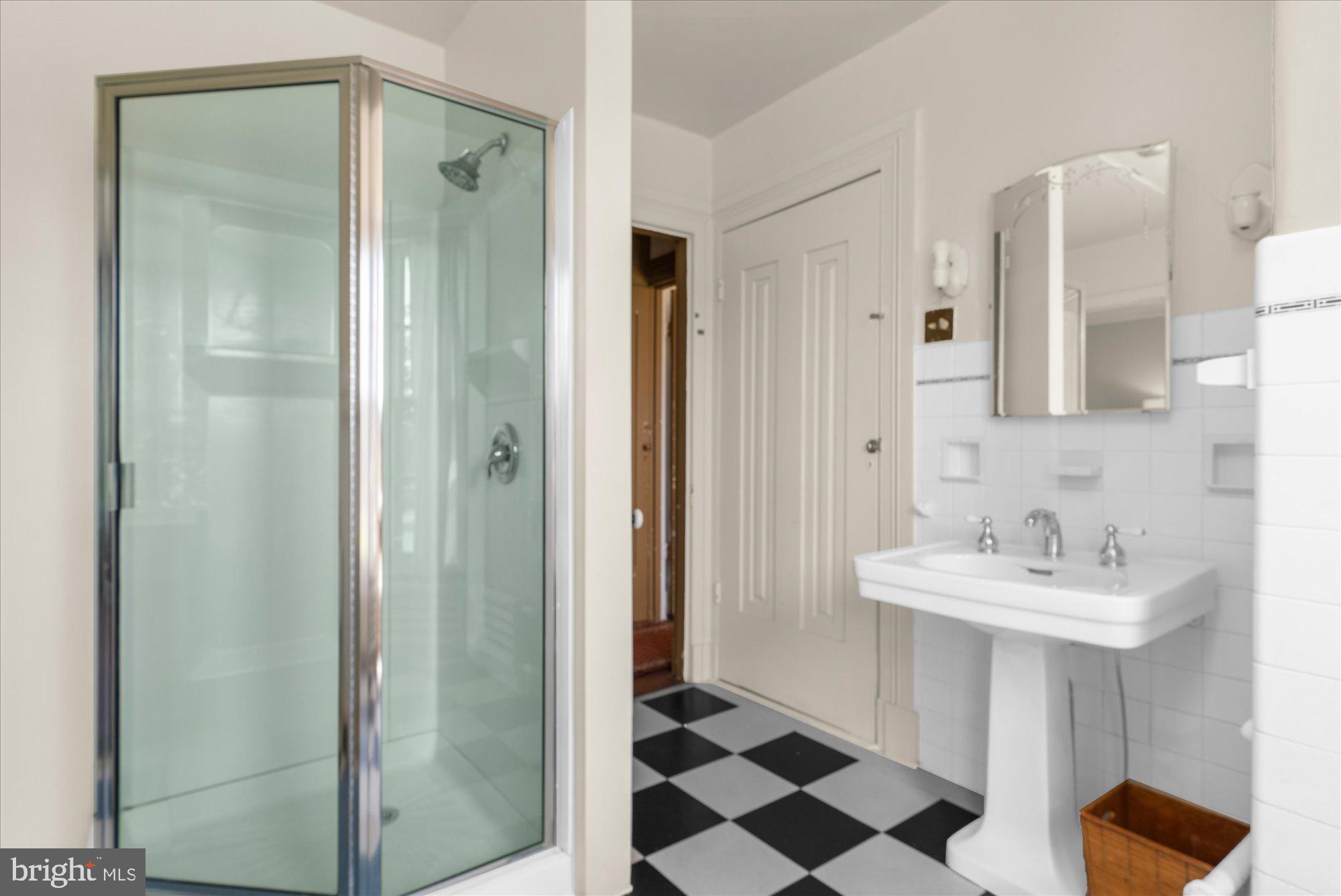 5358 York Road Doylestown, PA 18902 - Photo 23 of 61 a bathroom with a sink and a mirror