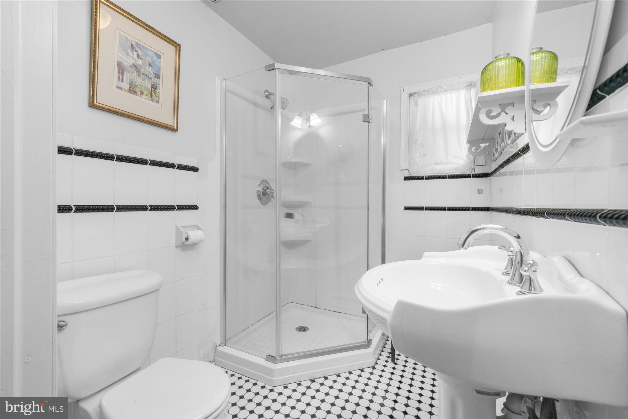 5358 York Road Doylestown, PA 18902 - Photo 40 of 61 a bathroom with a sink toilet and shower