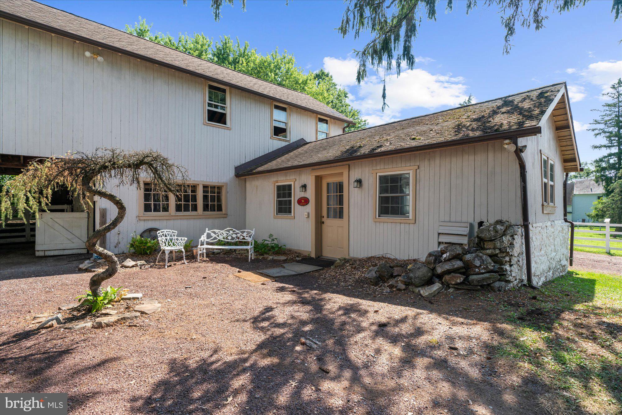 5358 York Road Doylestown, PA 18902 - Photo 41 of 61 a backyard of a house with table and chairs