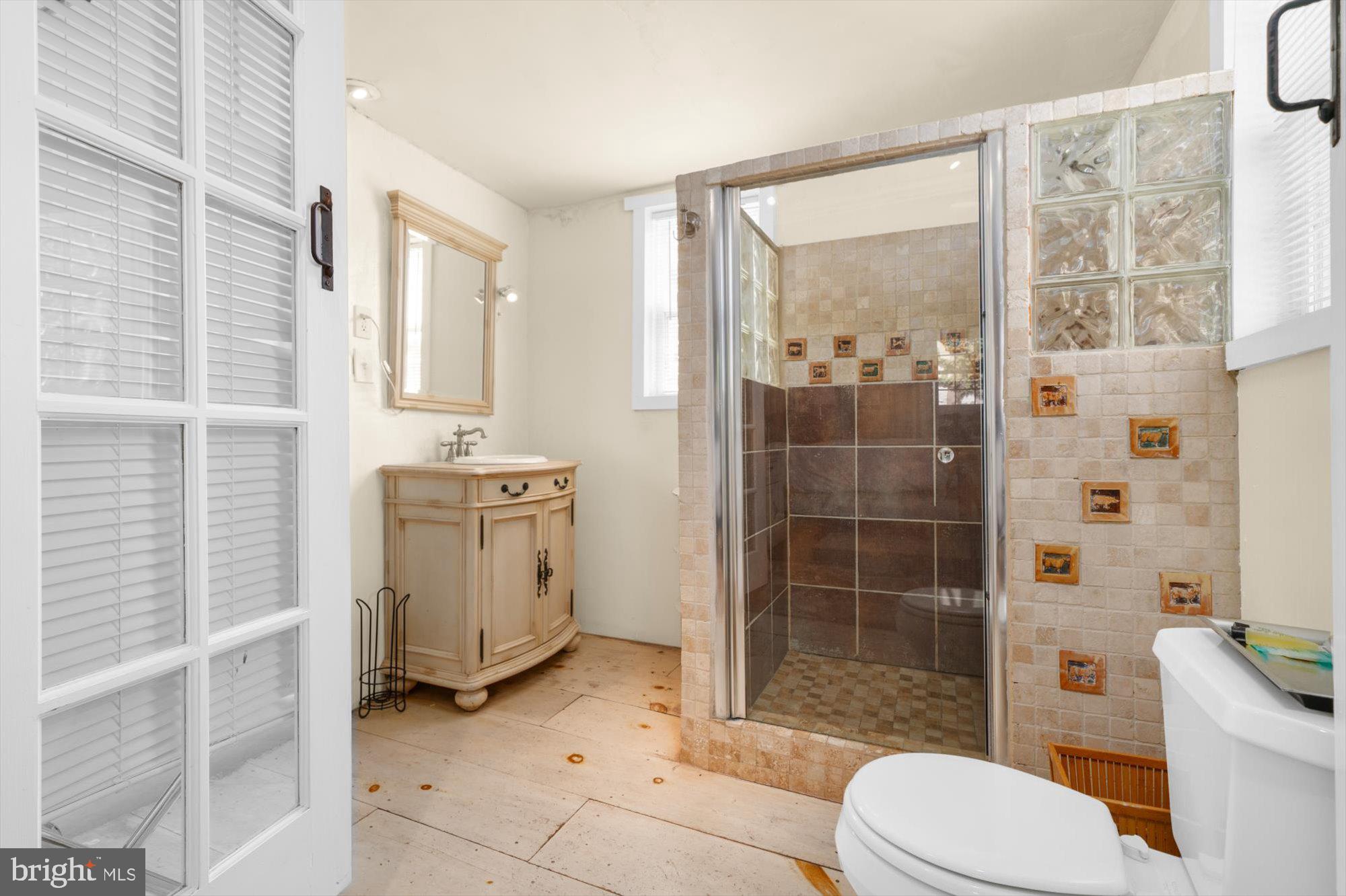 5358 York Road Doylestown, PA 18902 - Photo 44 of 61 a bathroom with a toilet a sink and shower