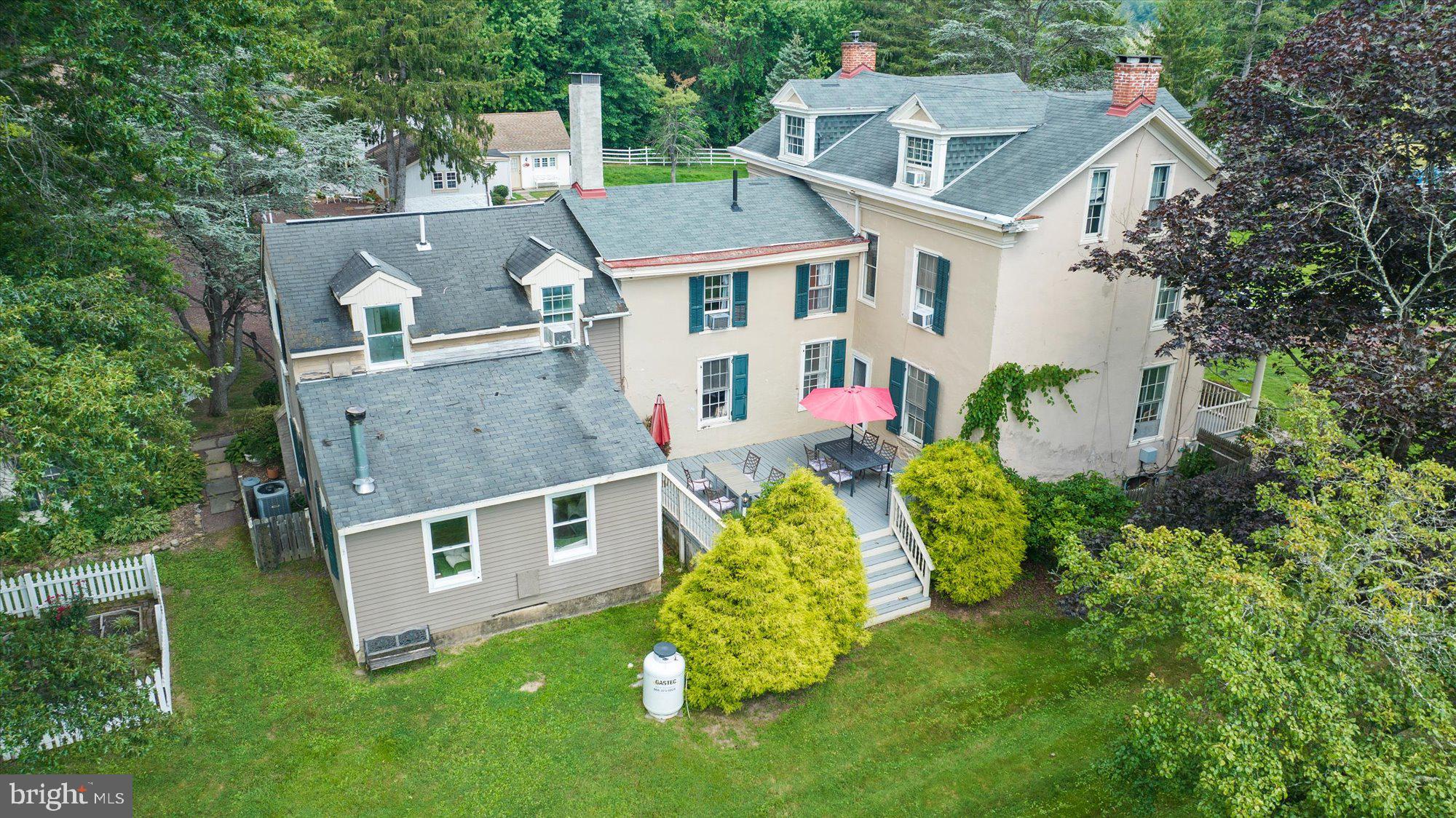 5358 York Road Doylestown, PA 18902 - Photo 9 of 61 aerial view of a house with a big yard and large trees