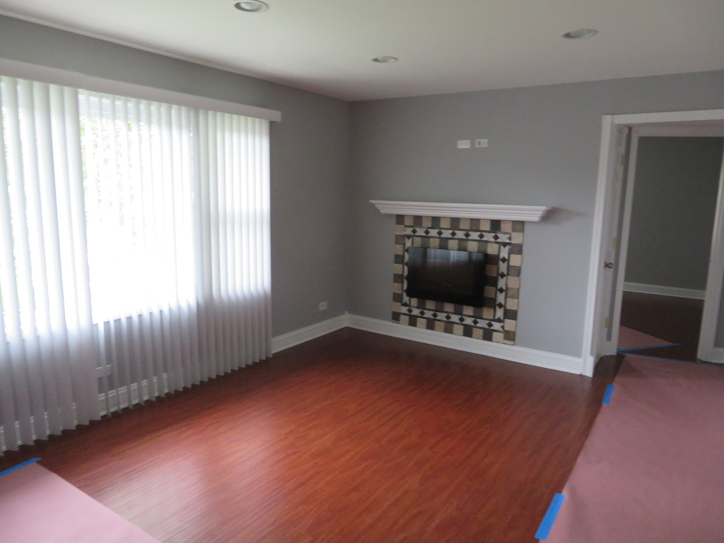 6834 West Lode Drive, Unit 3A Worth, IL 60482 - Photo 2 of 11 an empty room with windows