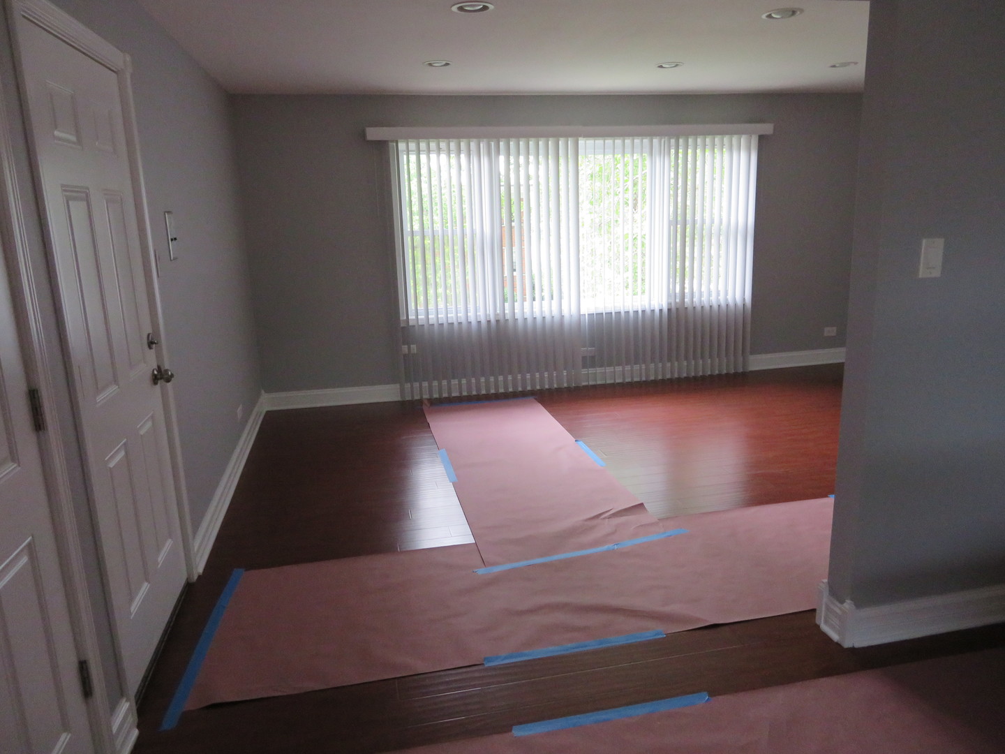 6834 West Lode Drive, Unit 3A Worth, IL 60482 - Photo 6 of 11 an empty room with wooden floor and windows