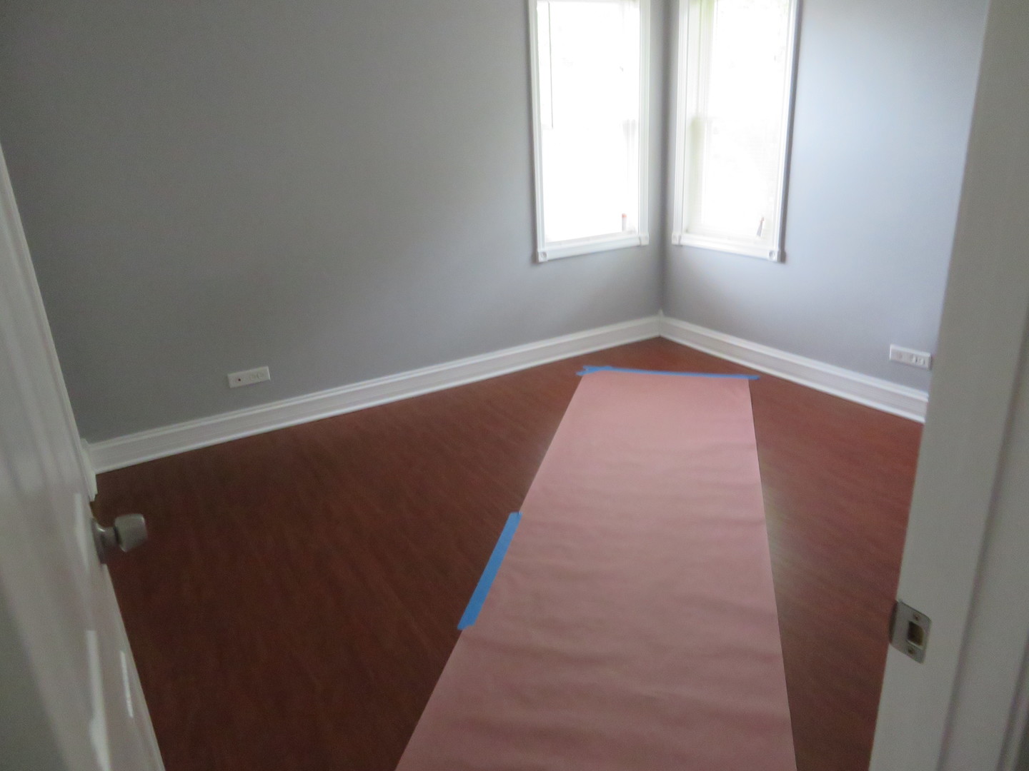 6834 West Lode Drive, Unit 3A Worth, IL 60482 - Photo 8 of 11 an empty room with wooden floor and windows