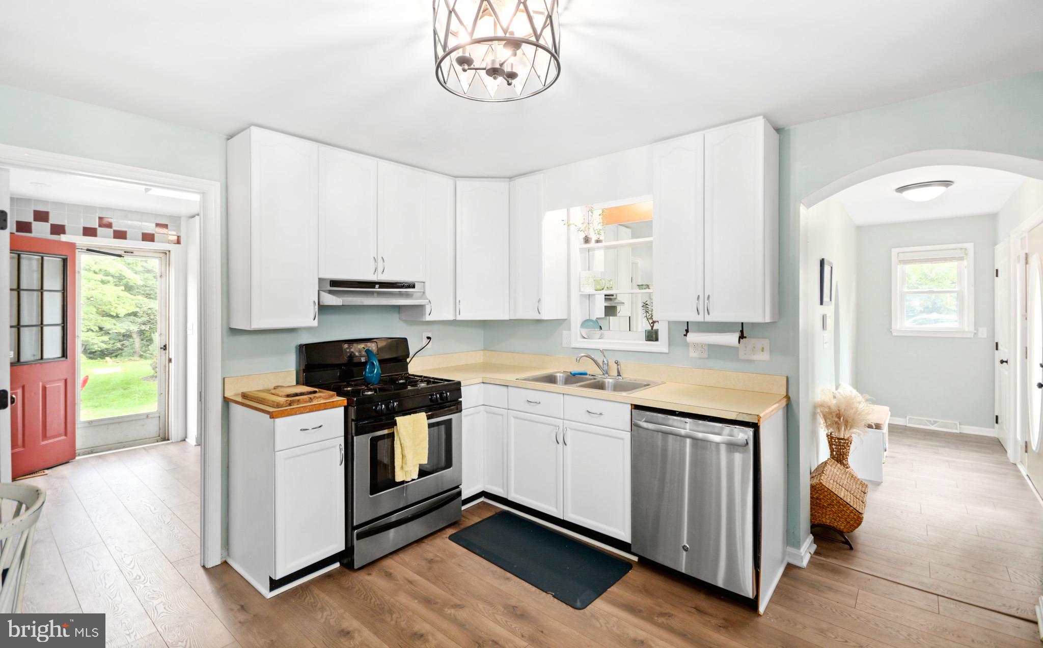 5604 Poole Road Jefferson, MD 21755 - Photo 14 of 49 Kitchen w/back door and front entry to right