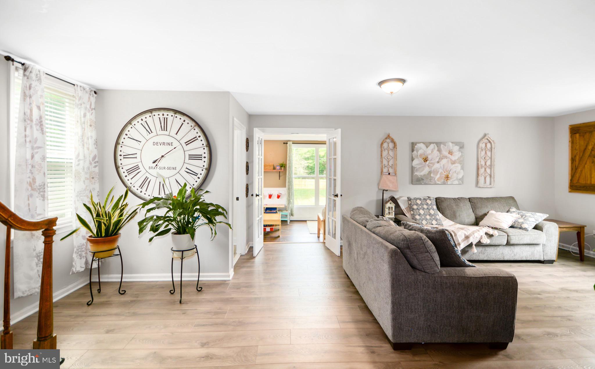 5604 Poole Road Jefferson, MD 21755 - Photo 18 of 49 Family room w/sunroom straight ahead