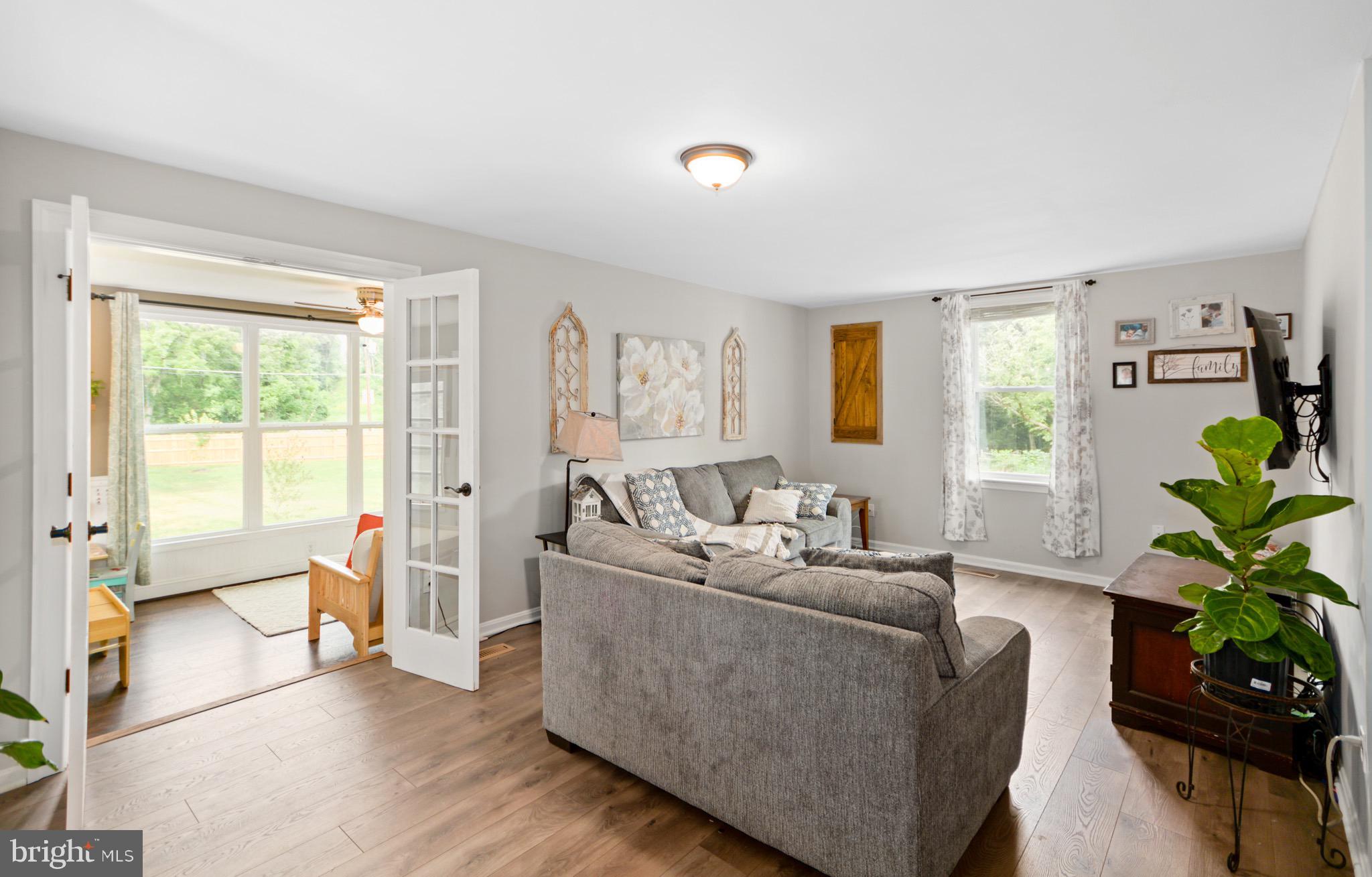 5604 Poole Road Jefferson, MD 21755 - Photo 21 of 49 Family room and dbl french door entry to sunroom