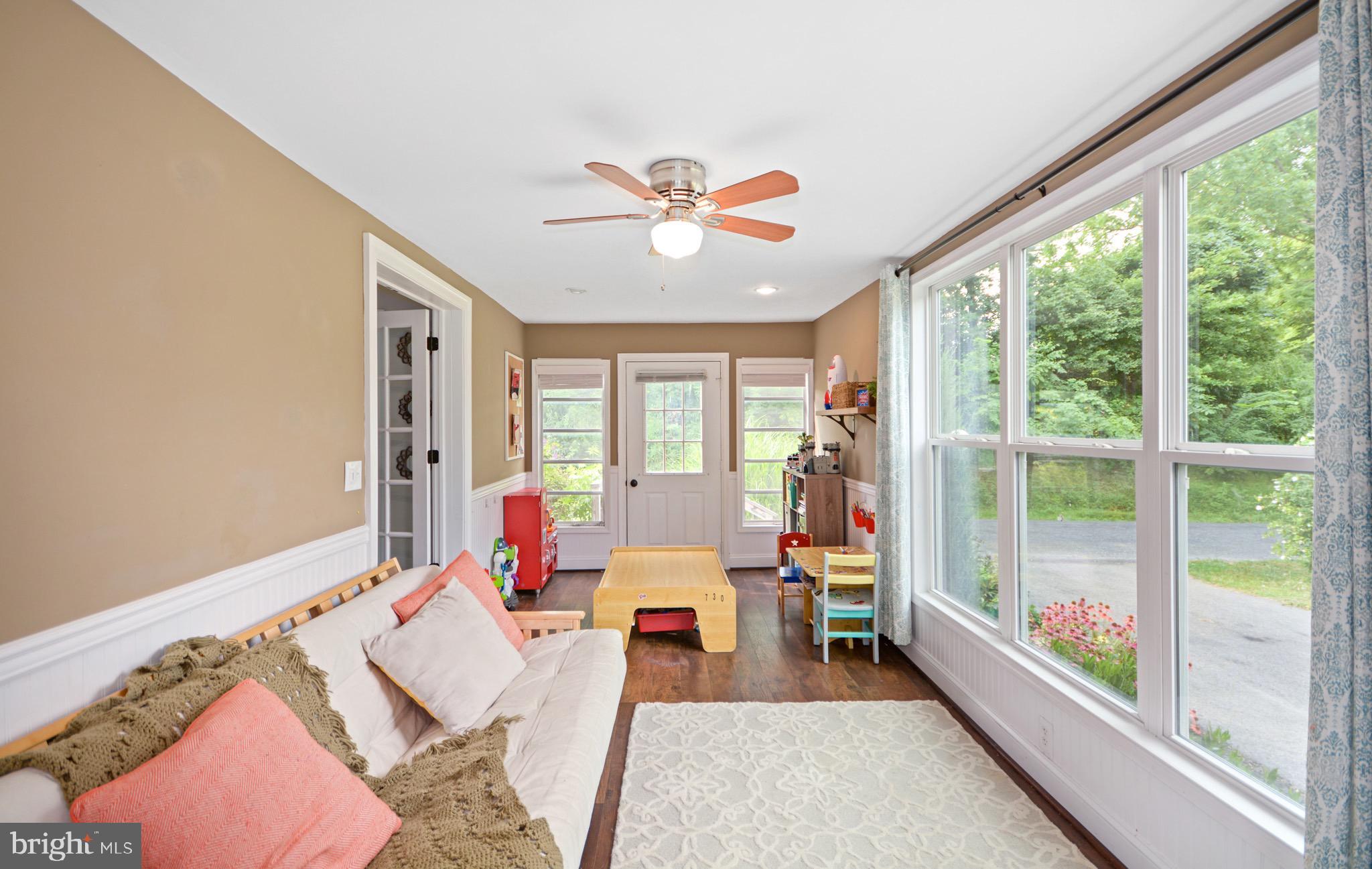 5604 Poole Road Jefferson, MD 21755 - Photo 23 of 49 sunroom looking to front of home w/parking area