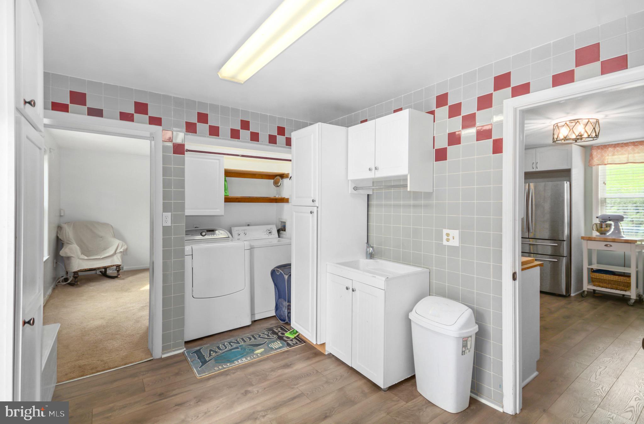 5604 Poole Road Jefferson, MD 21755 - Photo 35 of 49 main level laundry off kitchen w/3rd bdrm to left