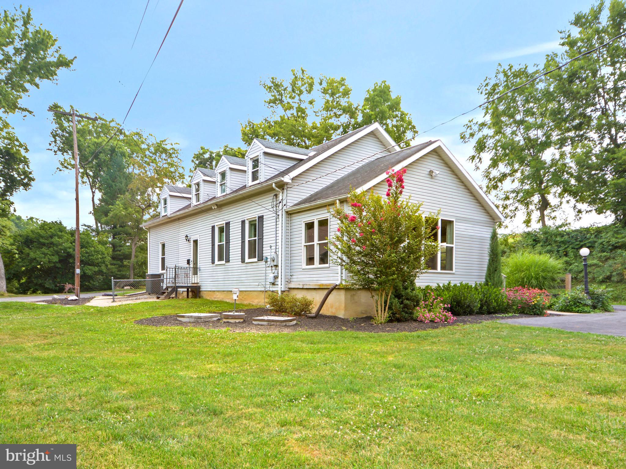 5604 Poole Road Jefferson, MD 21755 - Photo 40 of 49 view of rear of home w/addl parking area on right