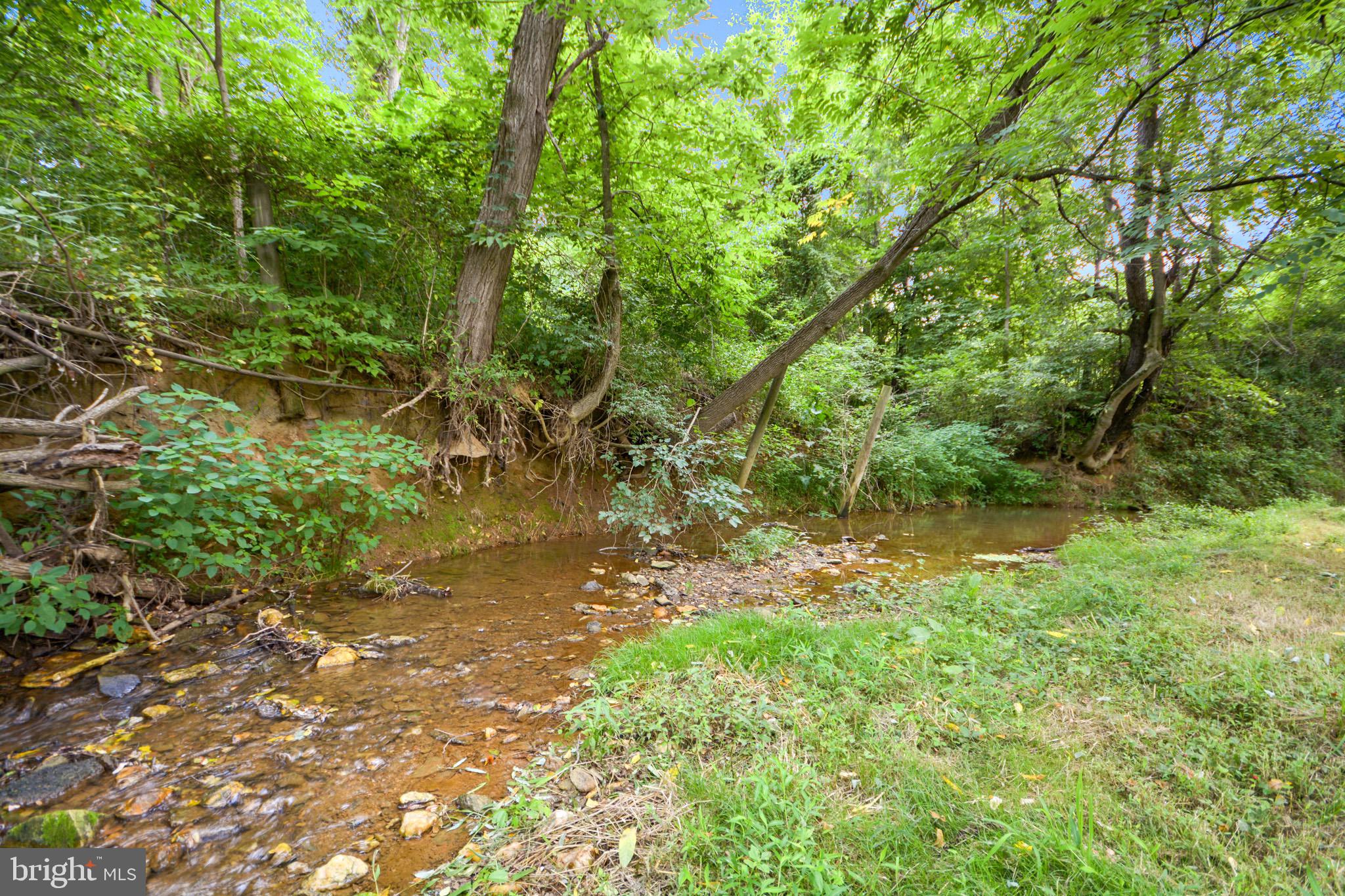 5604 Poole Road Jefferson, MD 21755 - Photo 47 of 49 babbling brook adjacent to property