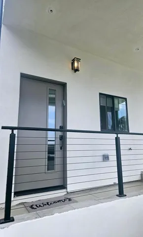 a view of a house with white door