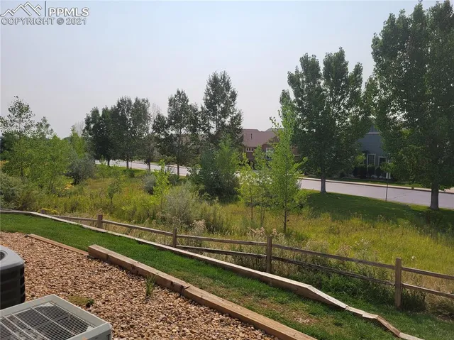 a view of a balcony with ocean view