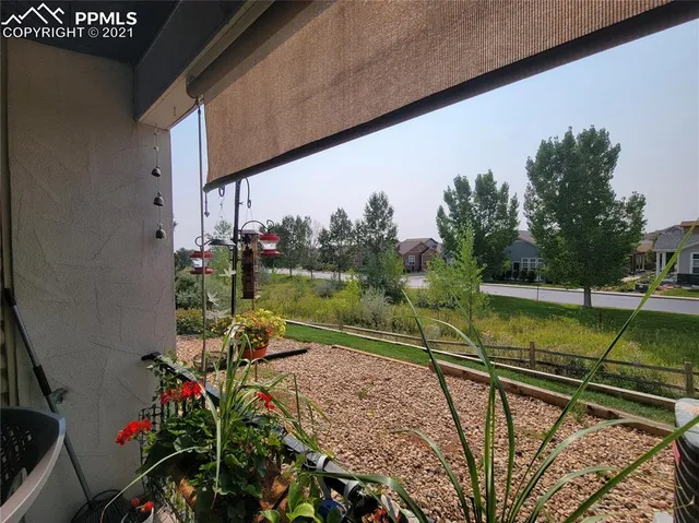 a view of a lake with a bench in front of it