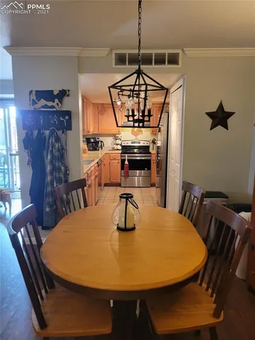 a view of a dining room with furniture