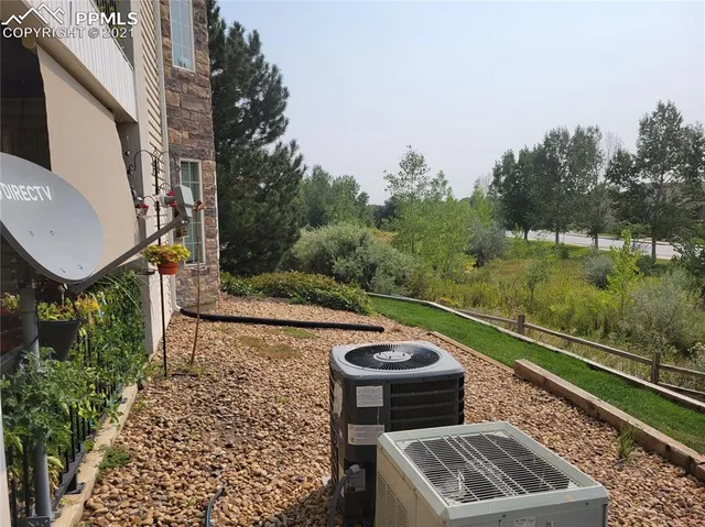 a view of a back yard of the house