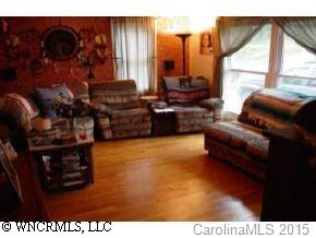 18 Smith Graveyard Road Asheville, NC 28806 - Photo 4 of 4 a living room with furniture and a large window