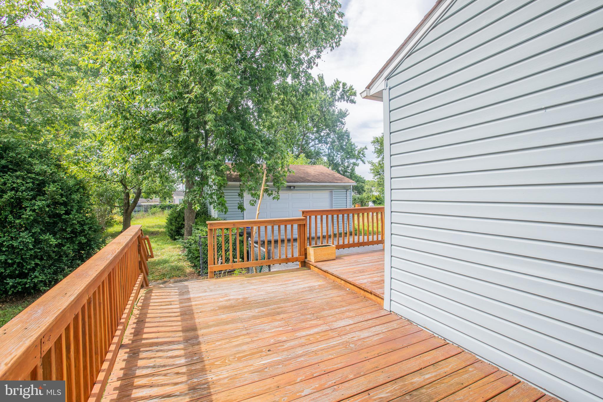 8875 Baltimore Street Savage, MD 20763 - Photo 15 of 32 view of balcony with wooden floor and fence
