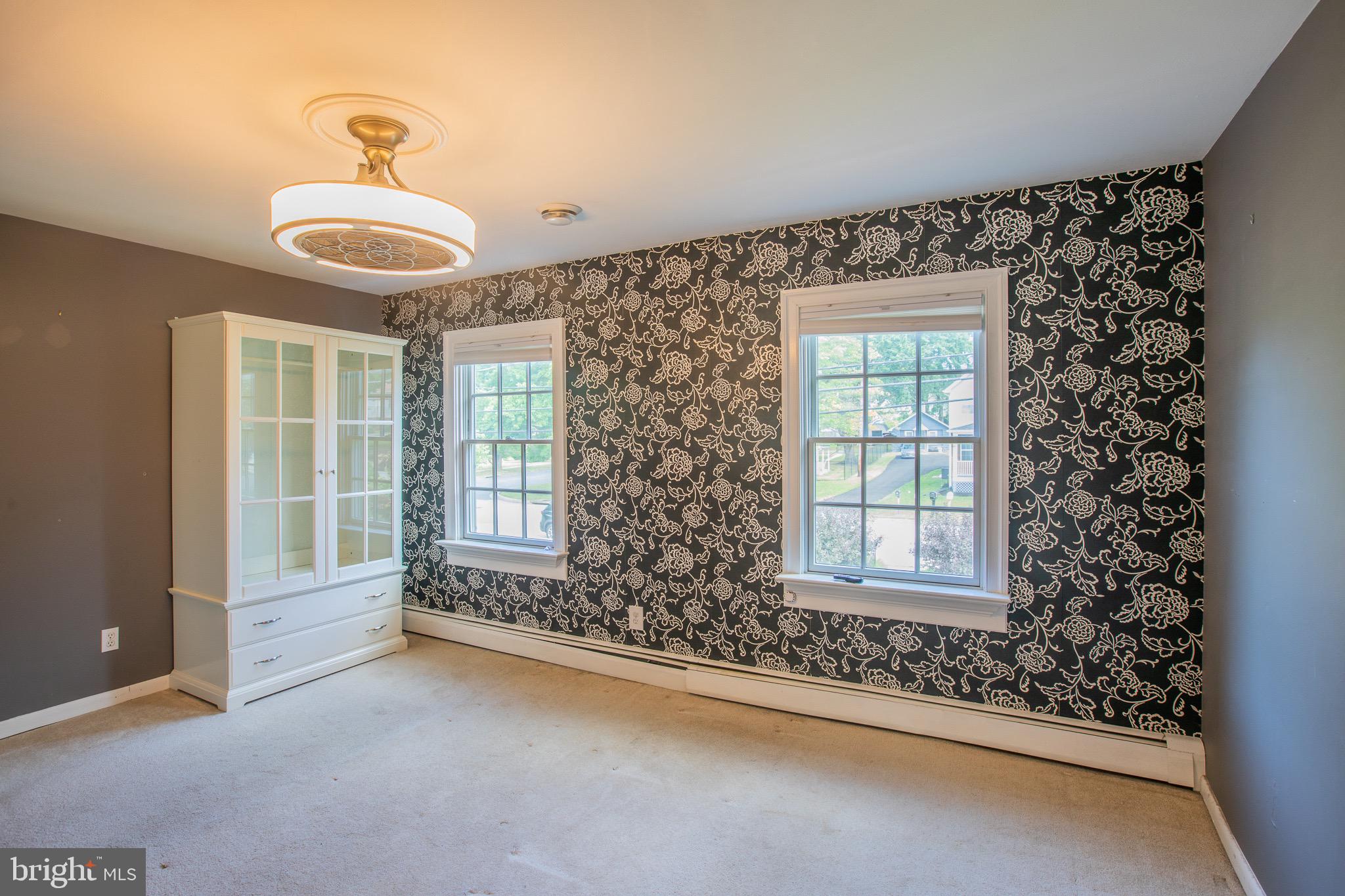 8875 Baltimore Street Savage, MD 20763 - Photo 17 of 32 a view of an empty room with a window